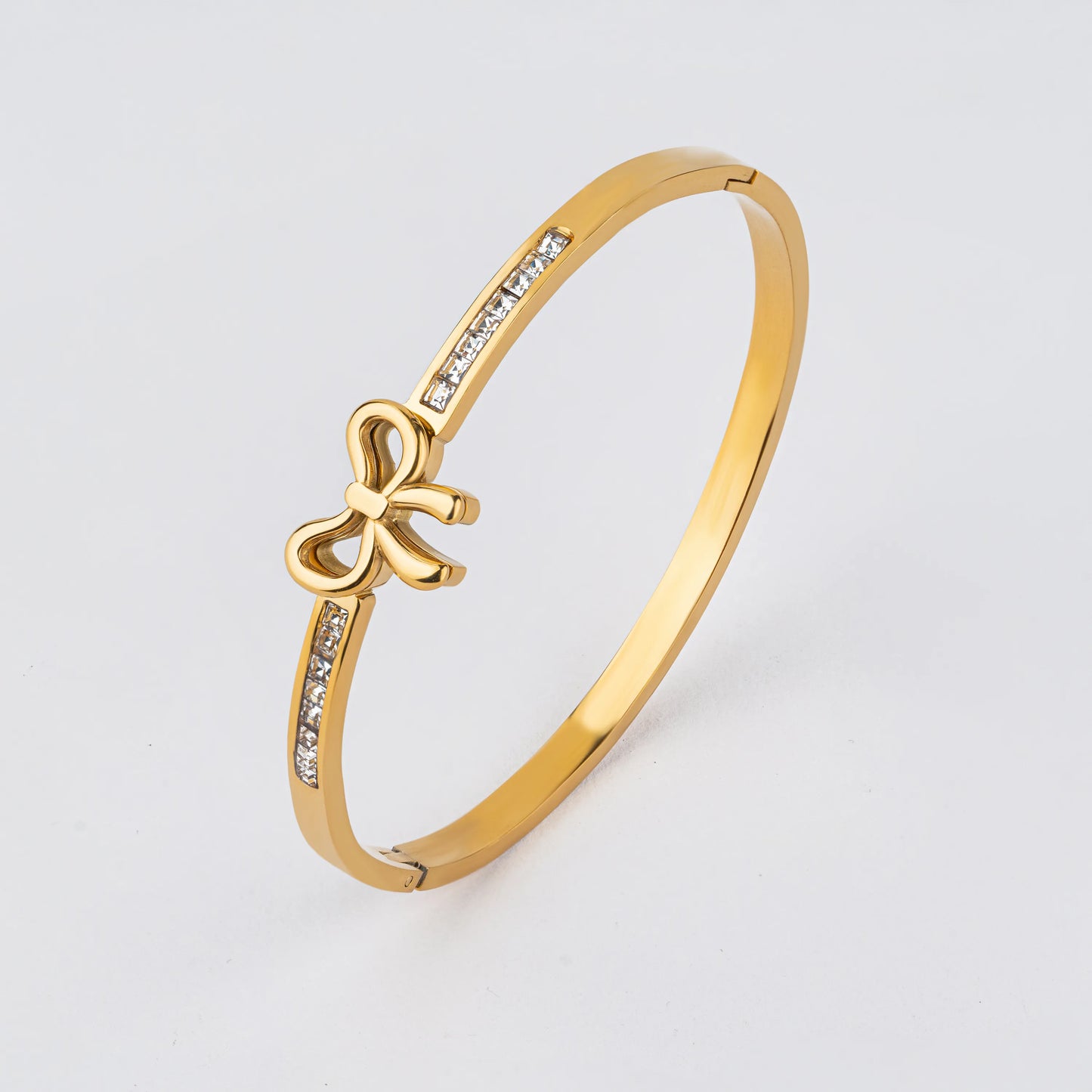 Poise – 18K Gold Plated Gold Bow CZ Bangle